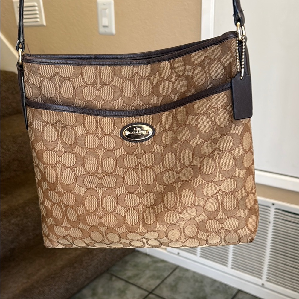 Original Coach Brown and Black Crossbody Bag
Practically new